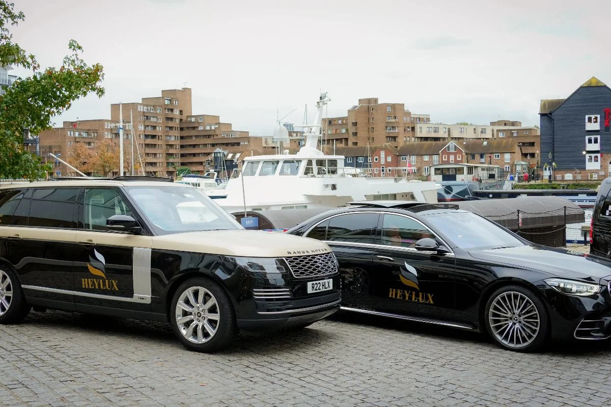 Chauffeur opening the door of a Mercedes S-Class