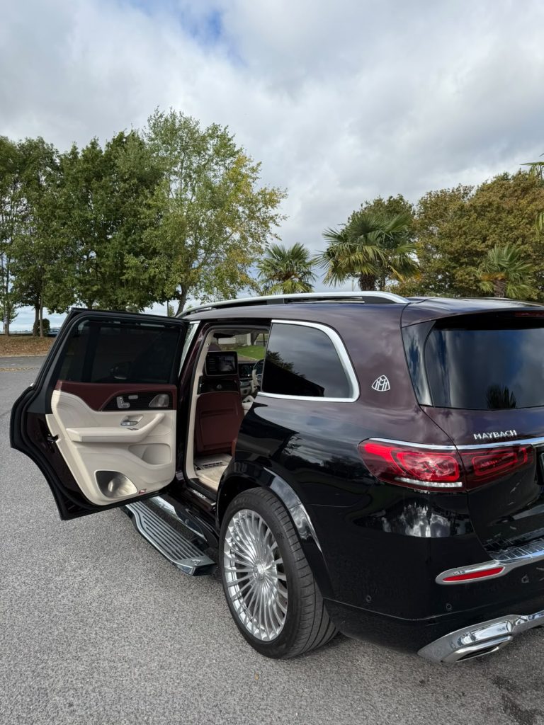 Mercedes-Maybach GLS 600 chauffeur car with rear door open and illuminated Maybach running board, Heylux Chauffeur London